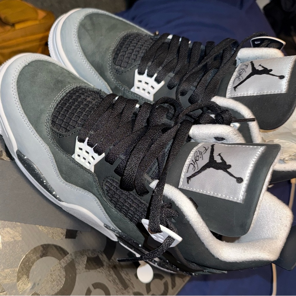 Air Jordan Retro 4 Sneakers in Black and Gray